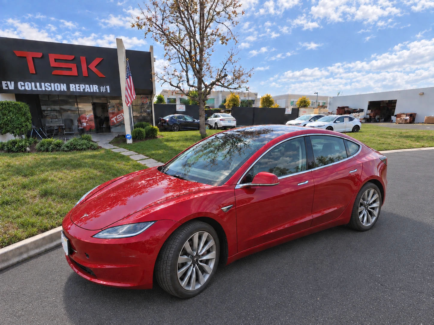 The same red Tesla Model 3 after collision repair at TSK