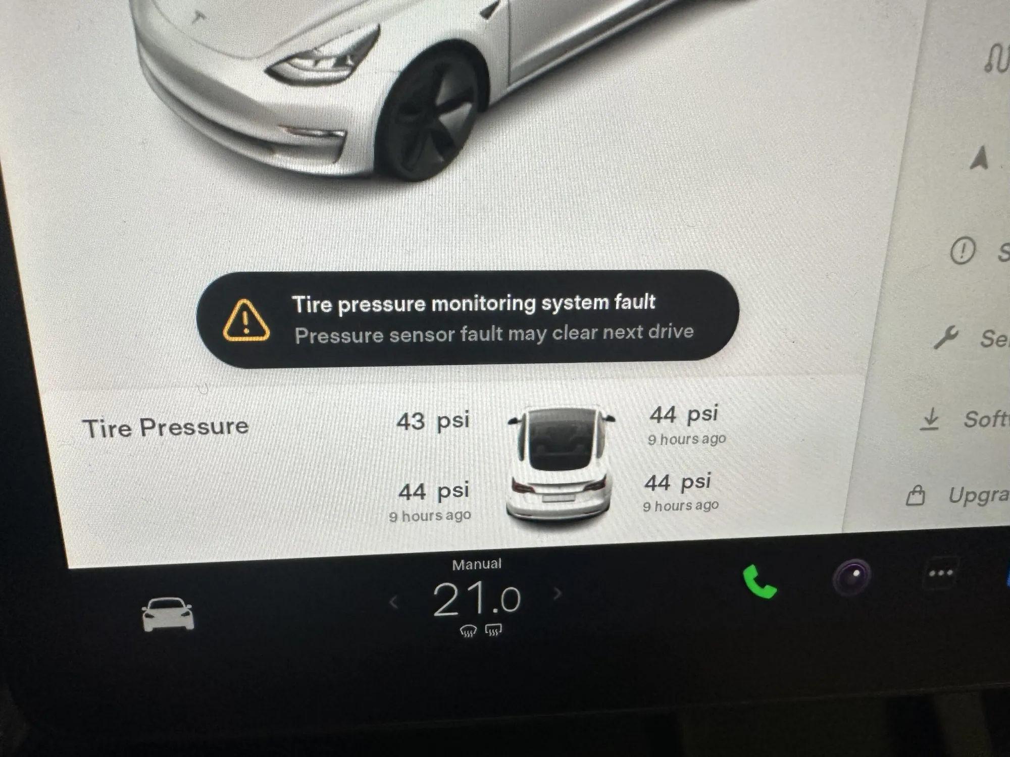 Tesla Model 3 touchscreen showing tire pressure monitoring system fault warning message