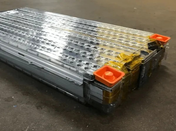 Tesla Model S high-voltage battery pack module with orange safety terminal covers