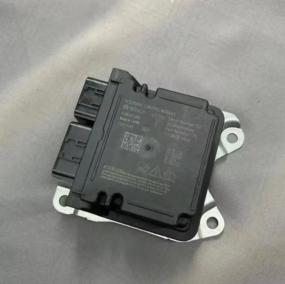 Bosch restraint control module for Tesla Model S, used in TSK programming service