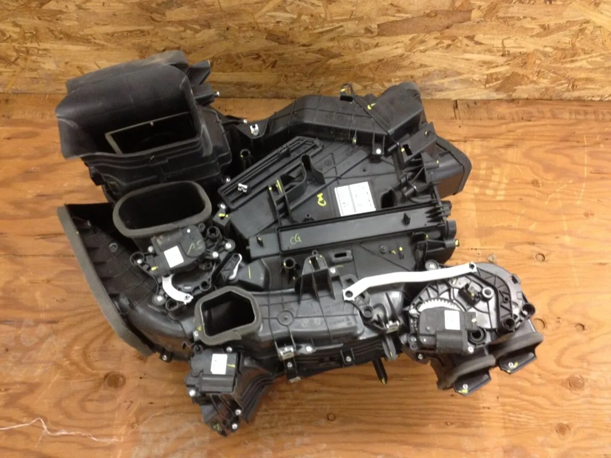Tesla Model Y HVAC heater core assembly removed for troubleshooting and repair