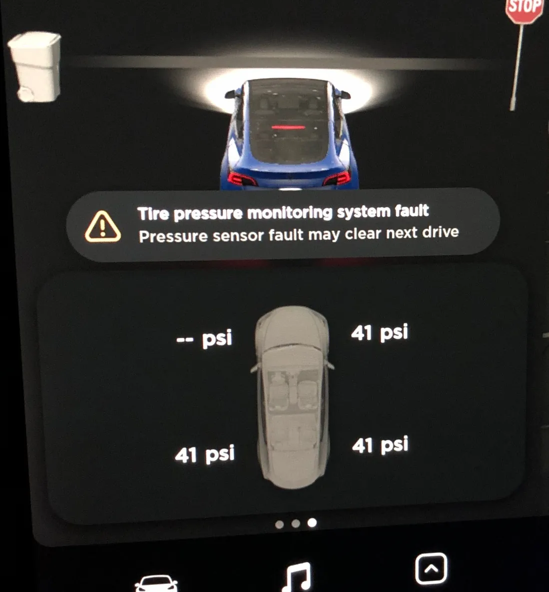 Tesla touchscreen showing tire pressure monitoring system fault with front-left sensor error
