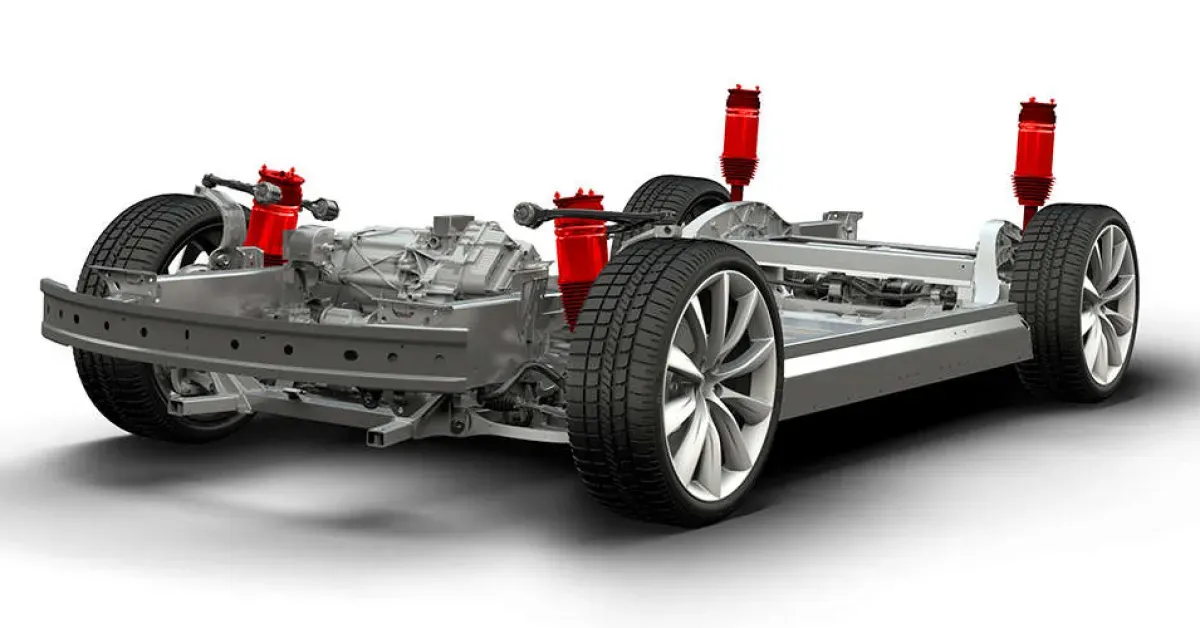 Tesla chassis with red air suspension struts and front wheels visible, all four corners shown