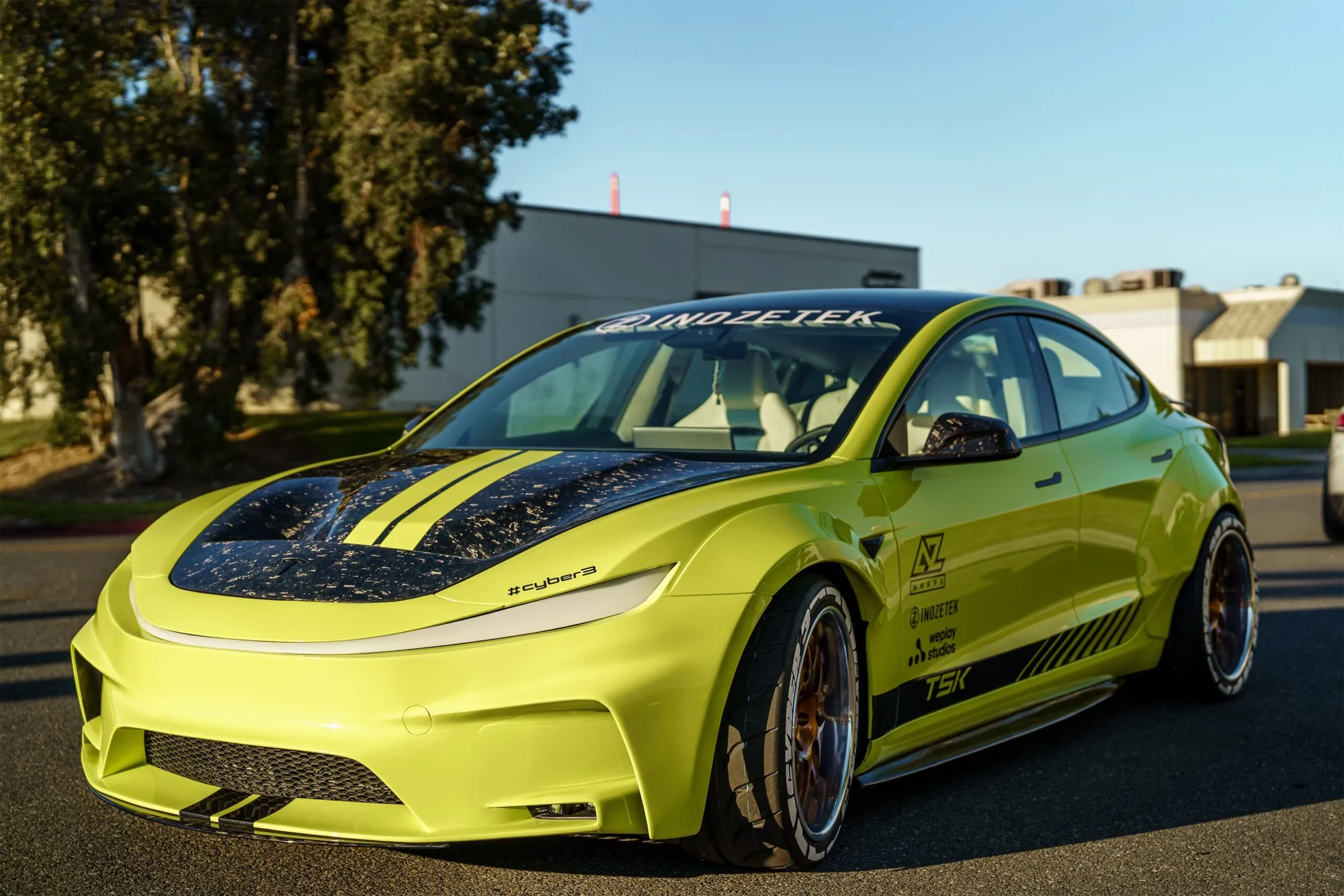Cyber 3 project: lime green widebody Tesla Model 3 with a forged carbon hood and bronze wheels